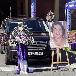 aurora funeral consultancy hearse flowers portrait